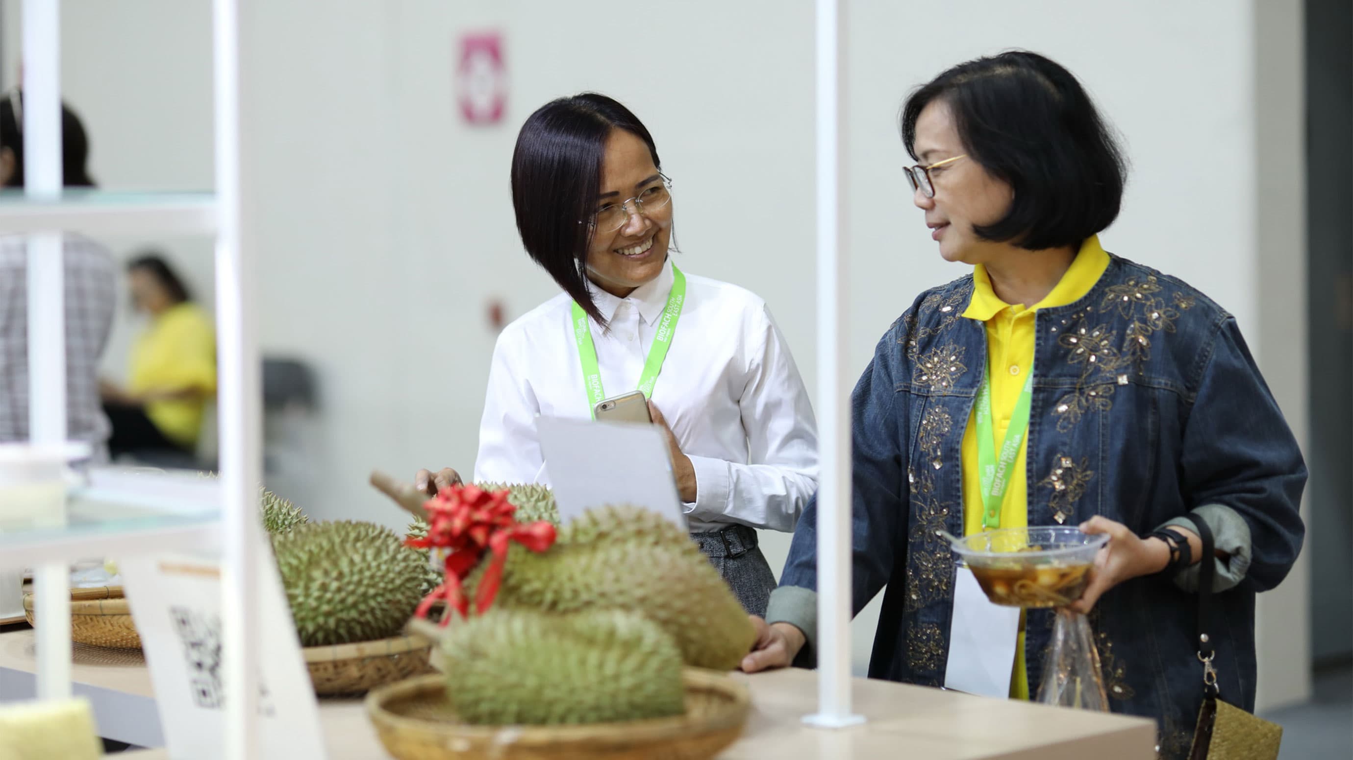 Two women talking about products